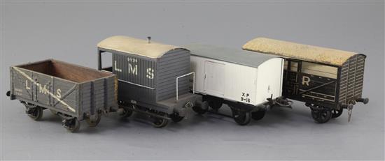 A set of four: SR box van No 764, LMS 7 plank open wagon No 266977,